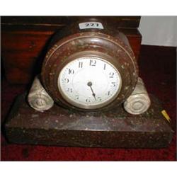 A c1920 serpentine mantel clock