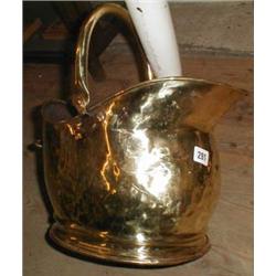 A brass coal scuttle