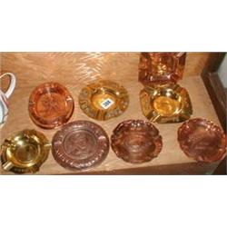 Eight assorted copper and brass advertising ashtrays including Player Navy Mixture, Johnny Walker, R