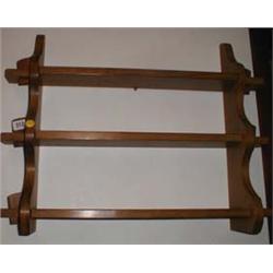 A C19th small open backed set of pine shelves