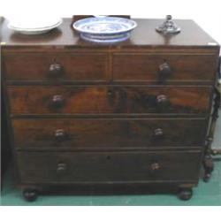 An early C19th flame mahogany two over three graduated chest of drawers