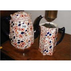 A C19th "Daisy" coffee pot and hot water jug