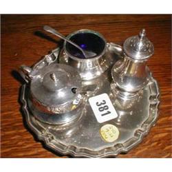 A Mappin and Webb silver plated Salt, Mustard and pepper pot on stand