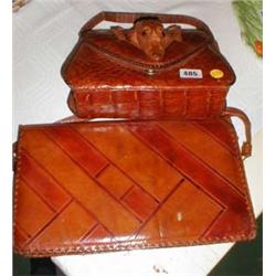 A crocodile skin handbag together with a leather handbag