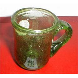 A C19th small green glass mug