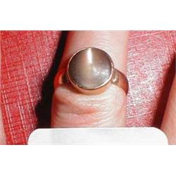 A rose gold dress ring