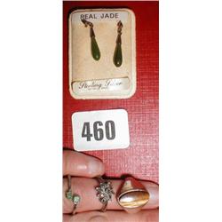 A pair of Jade earrings together with a Tigers Eye ring and two others