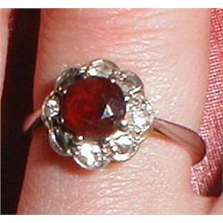 An 18ct gold and diamond and ruby ring