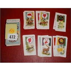 A set of John Players cigarette cards of wild animals