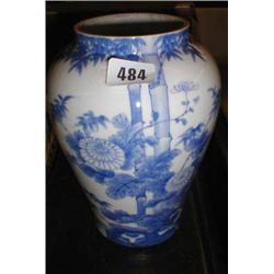 A C19th blue and white oriental vase with bamboo & chrysanthemum decoration