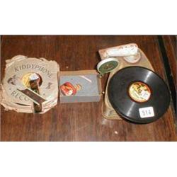 A c1930's tin plate "Kiddy Phone" record player complete with selection of records, needles etc