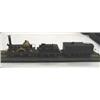 A finely engineered model brass steam train complete with track, rolling stock etc