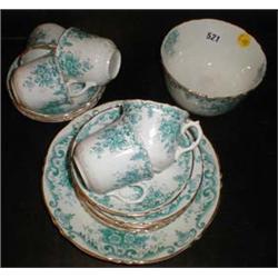 A C19th part tea set with blue floral decoration