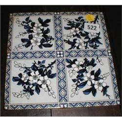 A 10" Minton tile with blue and white apple blossom decoration