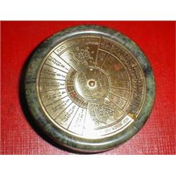 A serpentine calender with brass face