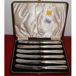 A boxed set of tea knives by Mappin and Webb