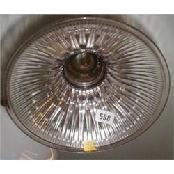 A c1910 ceiling hung holophane shade with brass fittings