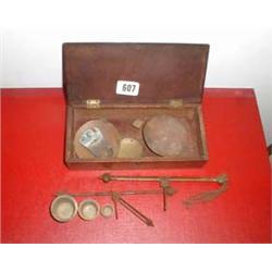 A mahogany boxed set of C19th balance scales