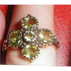 A 9ct gold Peridot flower ring