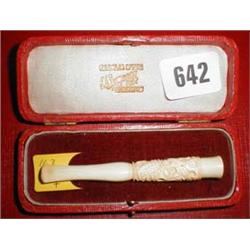 An ivory cigarette holder