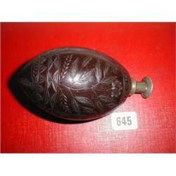 A C19th scrimshaw coconut  - possibly a powder flask