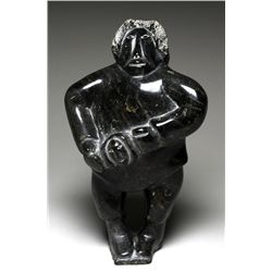 Sculpture of an Inuk Head Hunter by Mosesee Keyuajuk - Pangnirtung 1989  15 1/4" H. 9" W.  Good Cond