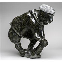 Hunter with Seal Carving - Unsigned - Cape Dorset 16  H. 17  L.  Good Condition
