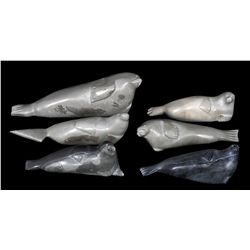 Six Seal Carvings by Various Sanikiluaq Artists Including Charlie Eyaituq 8" L. - 12" L.  All in Goo