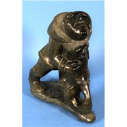 Adamie Alariaq Man and Sedna Sculpture - Cape Dorset 19 3/4" H. 16 1/2" W.  Good Condition