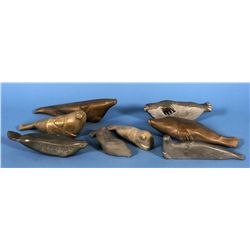 Eight Seal Carvings by Various Sanikiluaq Artists Including Mina and Annie Cookie 6 1/2" L. - 10" L.