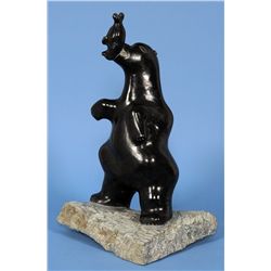 Sculpture of a Bear Holding a Seal by George Arlook (Arlu) 1981 - Arviat 16" H. 12 1/2" W.  Good Con