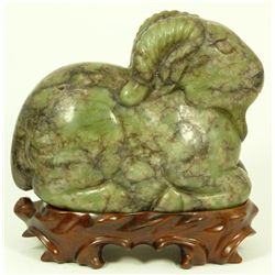 CHINESE MOTTLED JADE CARVING OF RECUMBENT RAM