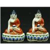 Image 1 : A PAIR OF MONGOLIAN SEATED PORCELAIN BUDDHAS