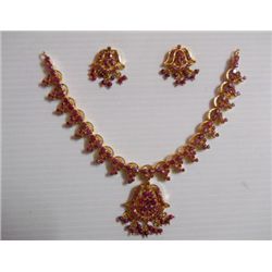 202.30 CTW GOLD PLATED RUBY NECKLACE AND EARRING SET ST