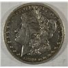 Image 1 : 1899 Morgan $  VF scratch on face est  $90-$100