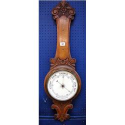 A c1920`s Oak framed Aneroid Barometer, (Thermometer missing).