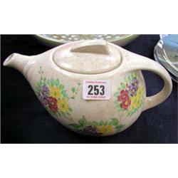 An E. Radford, floral pattern teapot.