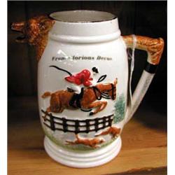 A Staffordshire hunting jug.