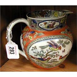 A mid 19thC painted panel polychrome jug, with Oriental bird decoration.