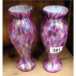 A pair of iridescent decoration glass vases.