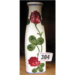 A Copenhagen vase hand painted with clover.