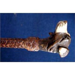 A superb Black Forest carved articulated dogs head riding crop.