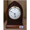 Image 1 : A c1910 carved Oak cased mantle clock in working order.