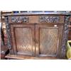 Image 1 : A carved Oak cupboard, one long drawer above a two panel door base.