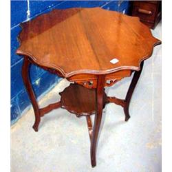 A c1900, Mahogany two tier table with shaped top.