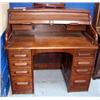Image 1 : A Mahogany Roll top desk.