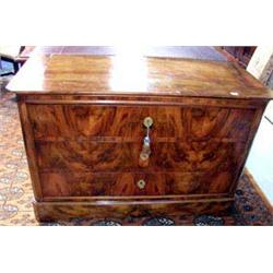 A good quality, figured Walnut, three-drawer chest with ornate escutcheons and key, c1890.