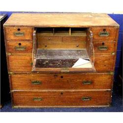 A Mahogany campaign, military chest in two sections, the top section having a fall front Secretaire