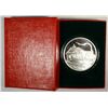 Image 1 : TRAIN DEPOT/TRAIN WINTER, ONE OUNCE .999 SILVER ART ROUND WITH CAPSULE/GIFT BOX