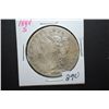 Image 1 : 1884-S US Silver Morgan $1; EST. $30-40